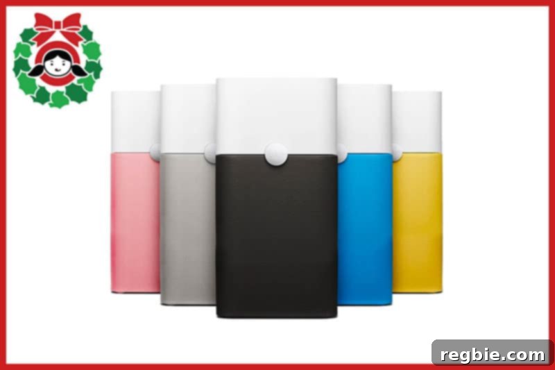 A set of multicolored Blueair Blue Pure 121 air purifiers, designed to keep indoor air clean and fresh.