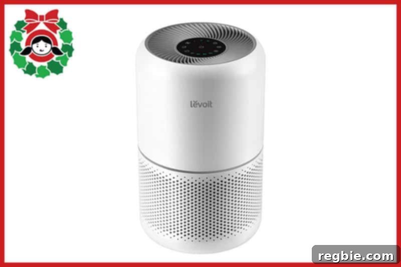 A front view of a white Levoit air purifier, a compact solution for cleaner bedroom air.
