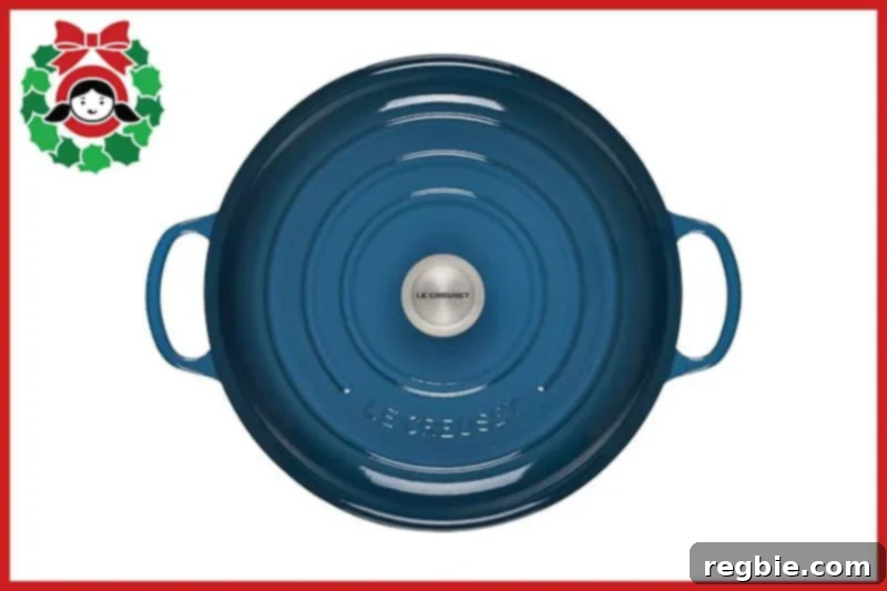 An overhead view of a beautiful blue Le Creuset Signature braiser, highlighted as a top kitchen gift.