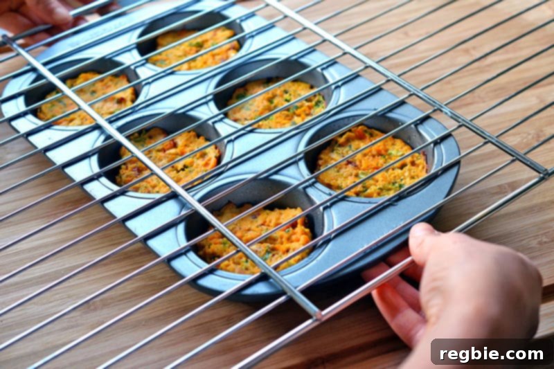 Someone getting ready to transfer the spicy tuna cakes onto a wire rack to cool.