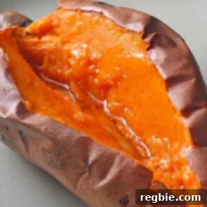 An overhead shot of a perfectly cooked baked sweet potato