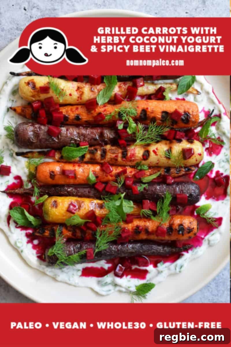 An overhead shot of grilled carrots on top of herbed coconut yogurt and topped with fresh herbs and pickled diced beets. There is a red banner at the bottom that says: paleo, Whole30, vegan, gluten-free