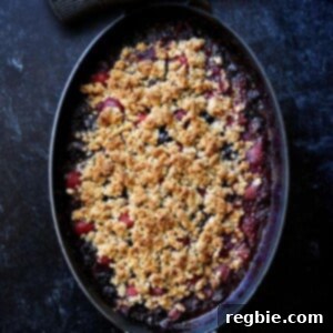 An overhead shot of a paleo and vegan berry crisp fresh out of the oven.