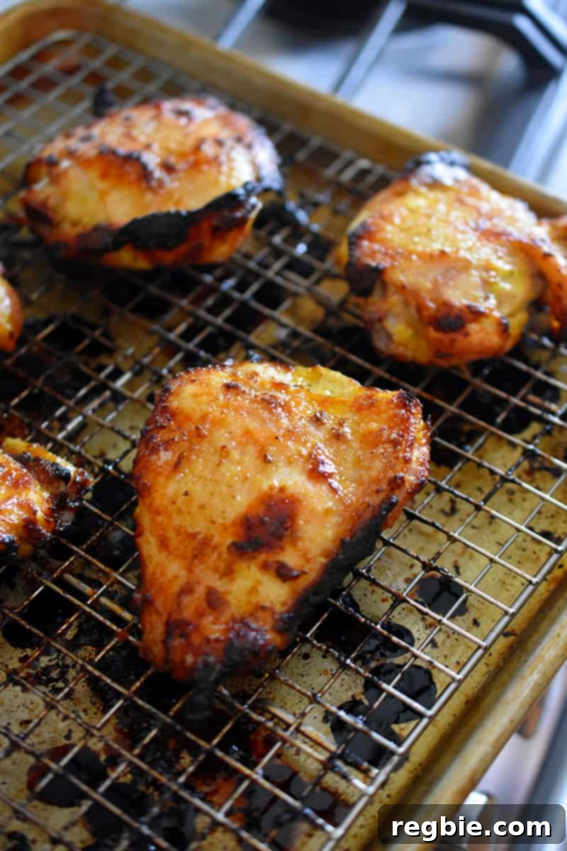 Closeup of a tray of oven roasted mojo chicken right out of the oven.