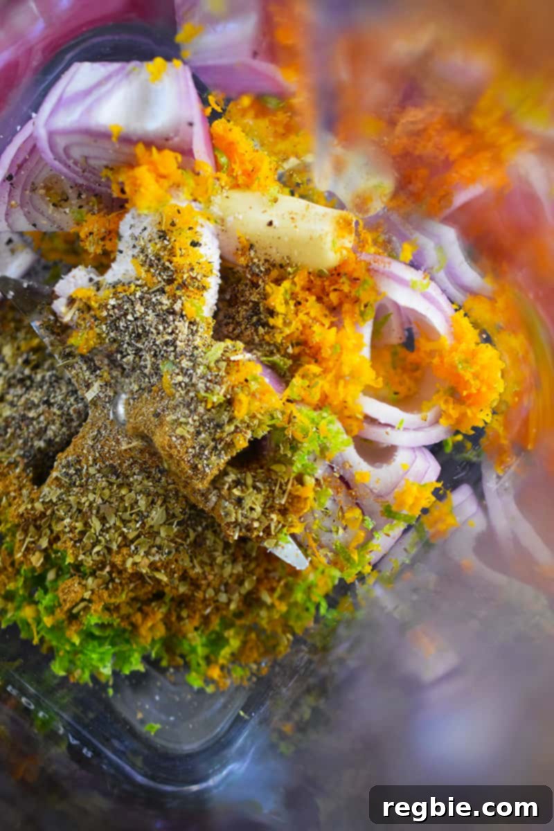 An overhead shot of the mojo marinade in the blender before it is blended.