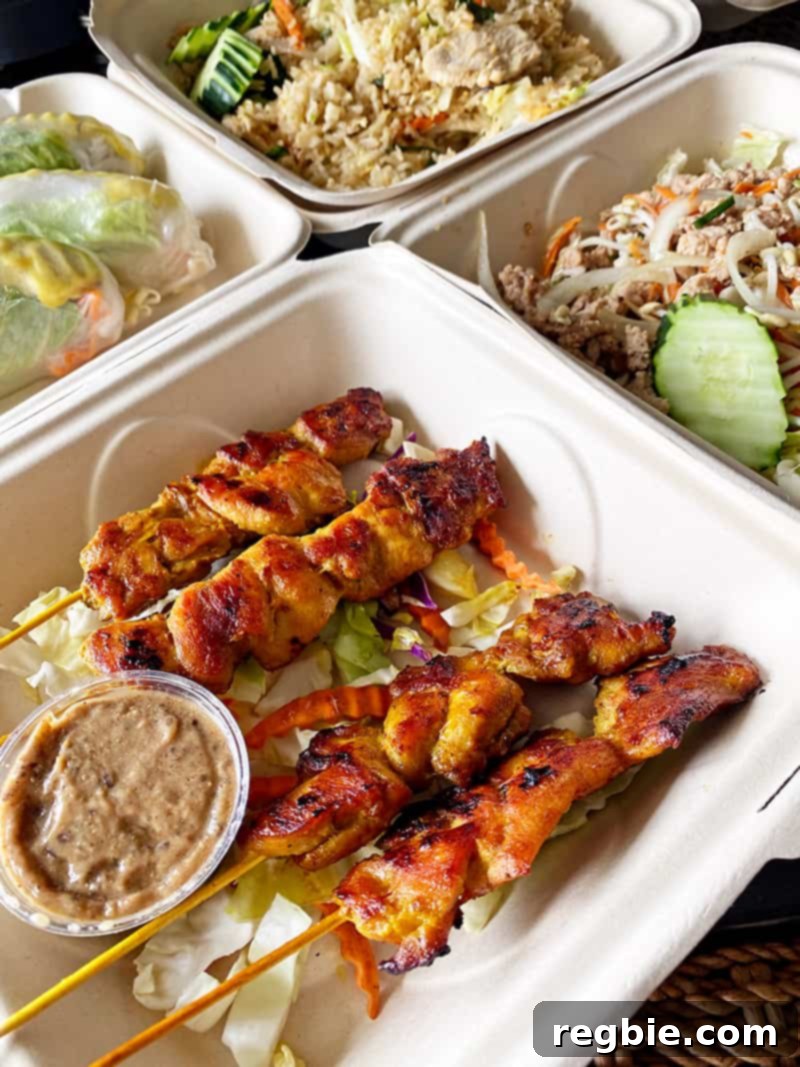 An overhead shot of gluten-free Thai takeout food from Racha Thai on the Big Island of Hawaii