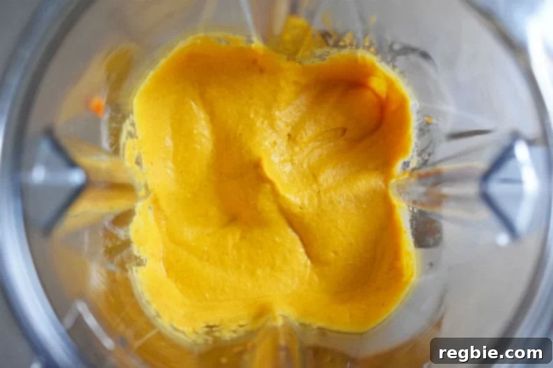 An overhead shot of the blended ingredients for the paleo sweet potato and cashew dip.