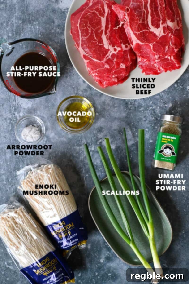 Wholesome Enoki Beef Wraps 4 The raw ingredients to make paleo, Whole30, gluten free, and keto beef and enoki mushroom rolls laid out on a cutting board