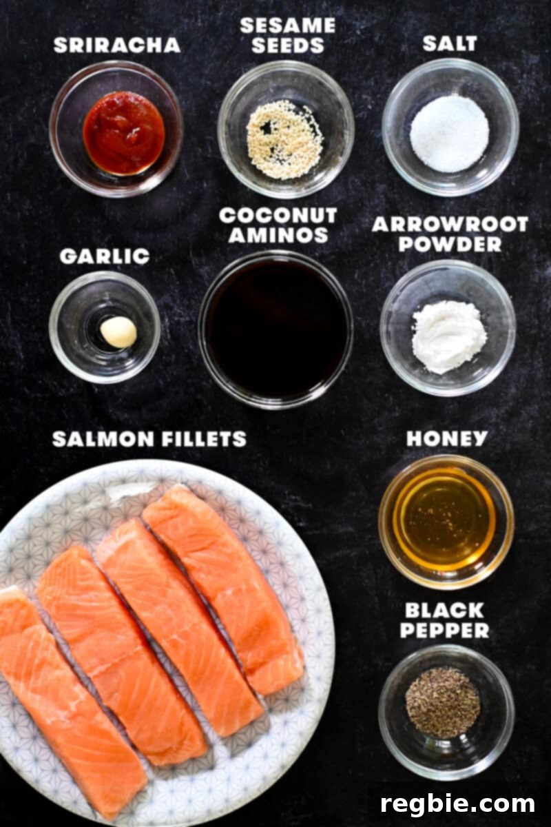 An overhead shot of all the fresh ingredients laid out for making air fryer salmon with honey sriracha glaze.