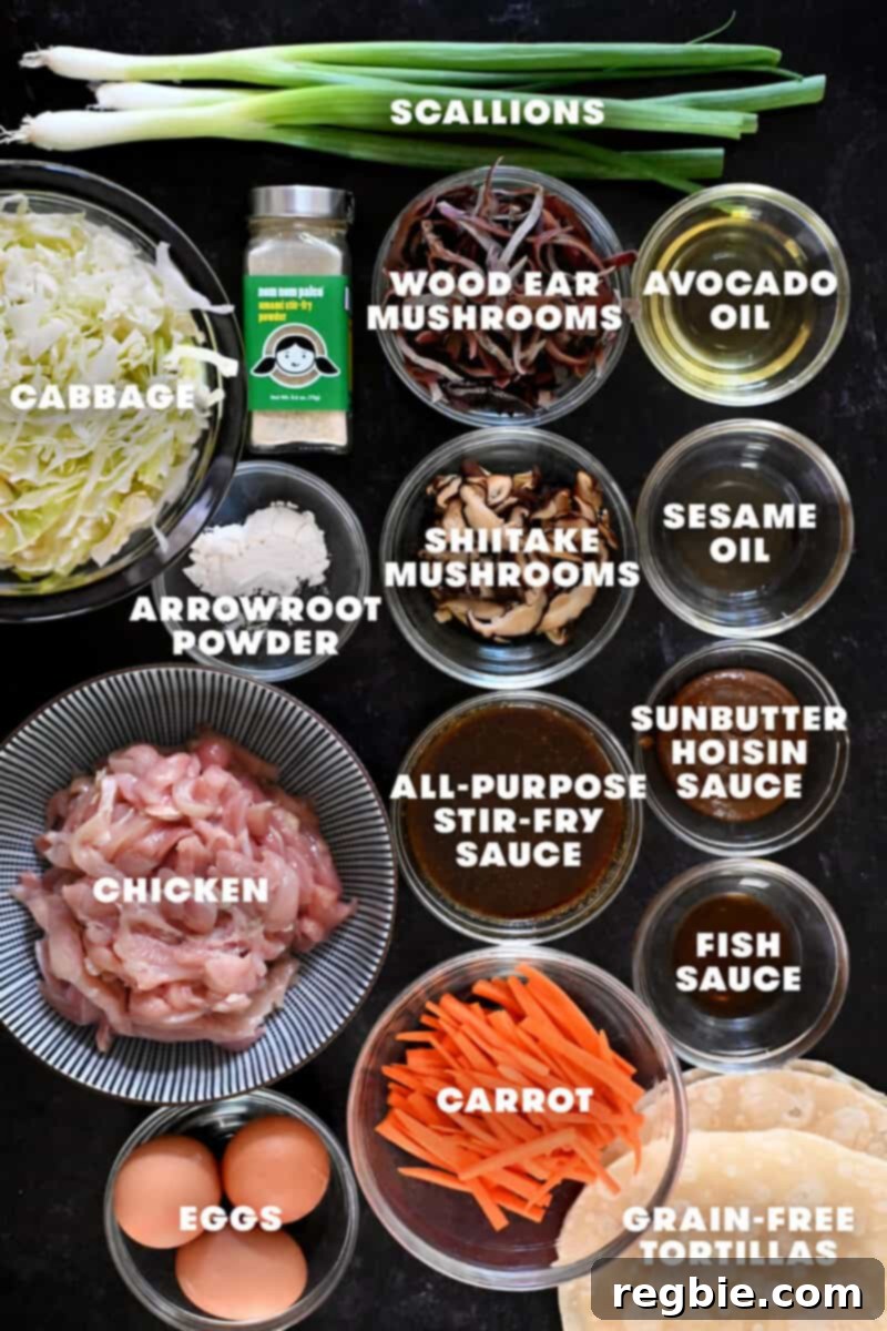 An overhead shot of the raw ingredients to make paleo, gluten free, and Whole30 Moo Shu Chicken, neatly arranged.