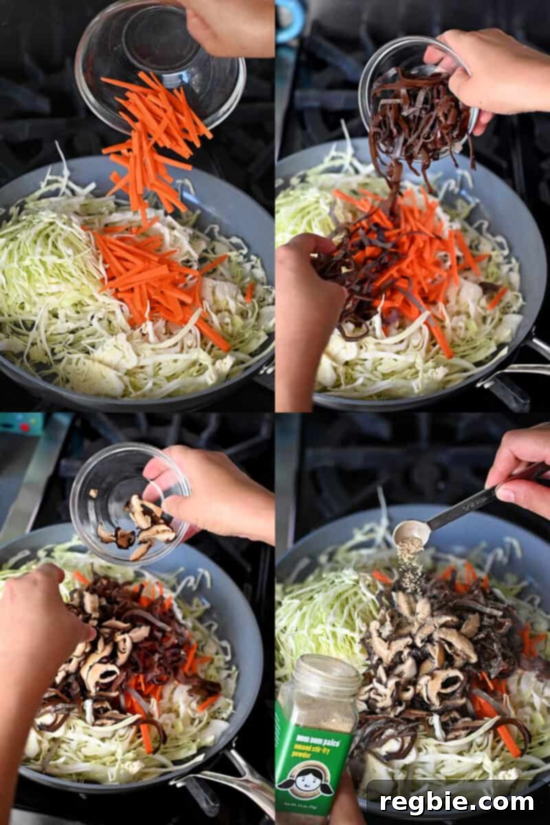 Adding the shredded cabbage, sliced carrots, and sliced mushrooms to a large skillet to make Moo Shu Chicken, ensuring even cooking.