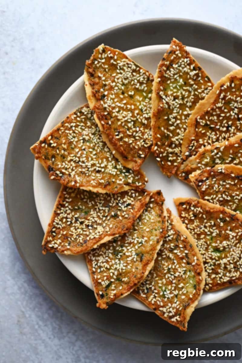 Wholesome Paleo Shrimp Toast 4 An overhead shot of a plate topped with golden brown gluten free and paleo shrimp toast, ready to be served.