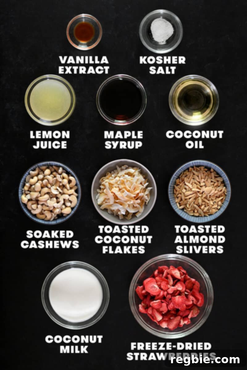 An inviting overhead photograph showcasing the raw, measured ingredients for paleo and vegan strawberry cheesecake bars, neatly arranged in elegant glass bowls.