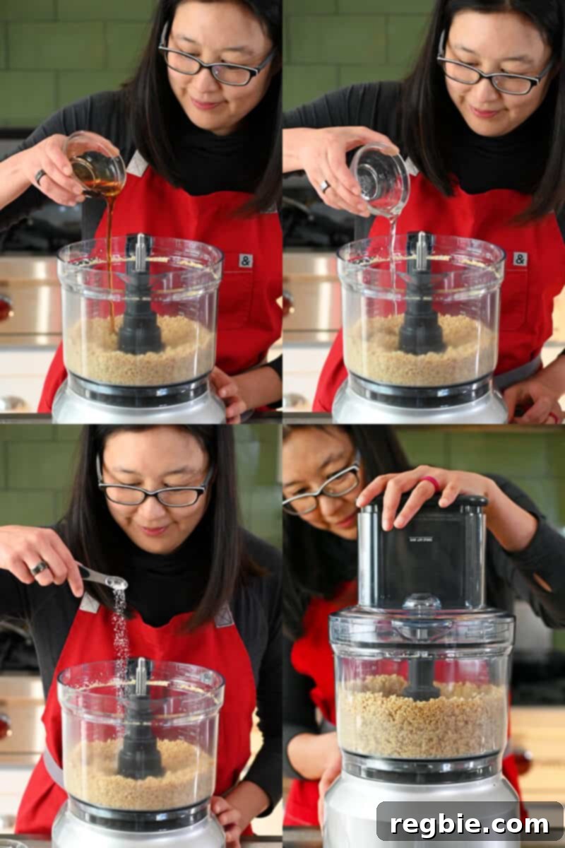 A sequence of four process shots depicting an Asian woman adding maple syrup, then melted coconut oil, and finally salt to a food processor bowl filled with processed toasted almonds and coconut flakes for the crust.