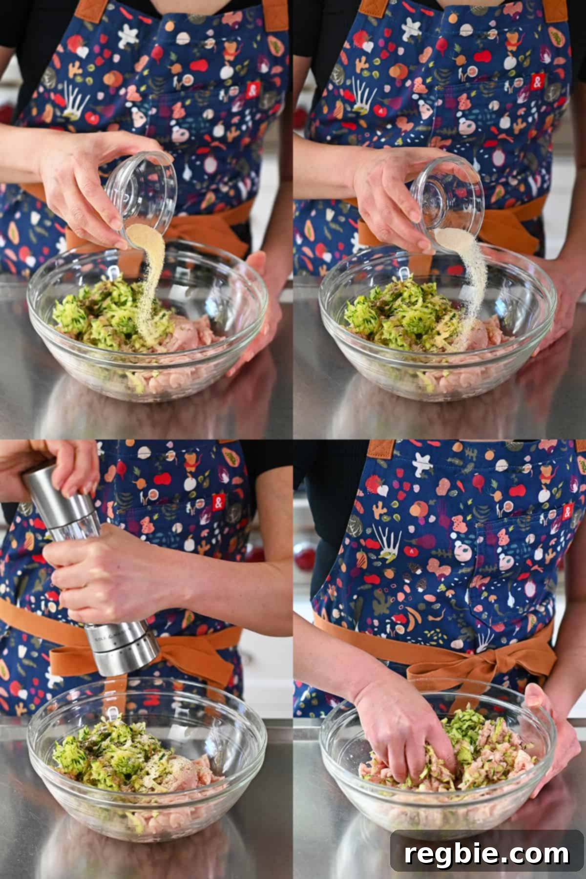 A person in a blue apron meticulously adds all the raw ingredients for the chicken meatballs into a spacious glass mixing bowl, showcasing the start of the preparation process.