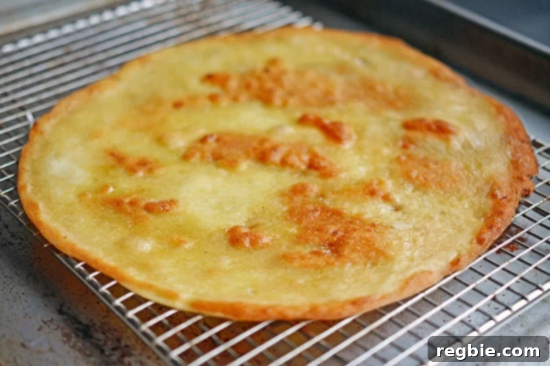 Aromatic Keema Samosa Platter 18 Pan fried paleo dough cooling on a wire rack, ready to be paired with spiced keema.