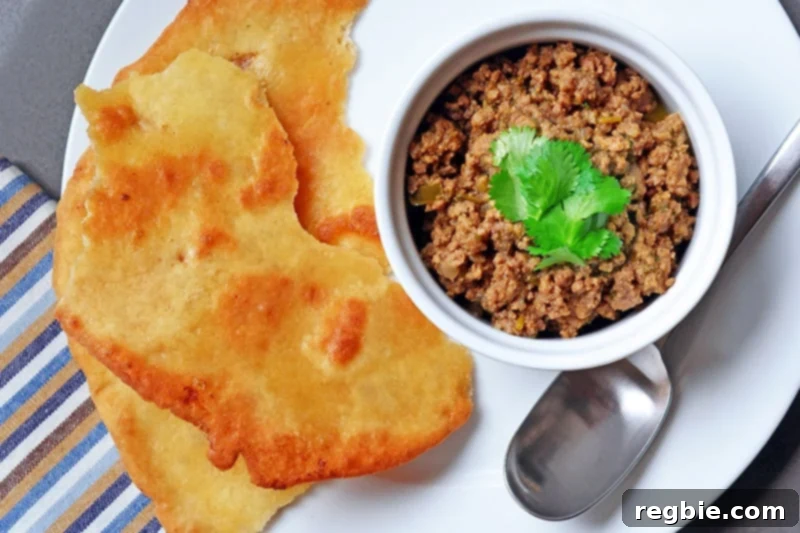 Aromatic Keema Samosa Platter 20 Deconstructed Samosa (spiced keema) served elegantly with a side of crispy fried paleo dough, creating a complete grain-free Indian meal.
