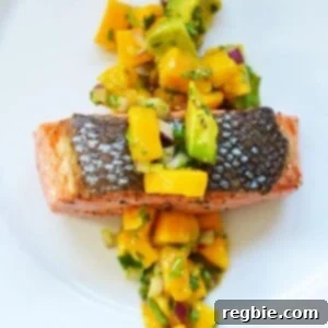 Mango and Avocado Salsa on Pan-Seared Salmon by Michelle Tam / Nom Nom Paleo https://nomnompaleo.com
