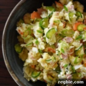 An overhead shot of a serving bowl filled with Japanese potato salad.