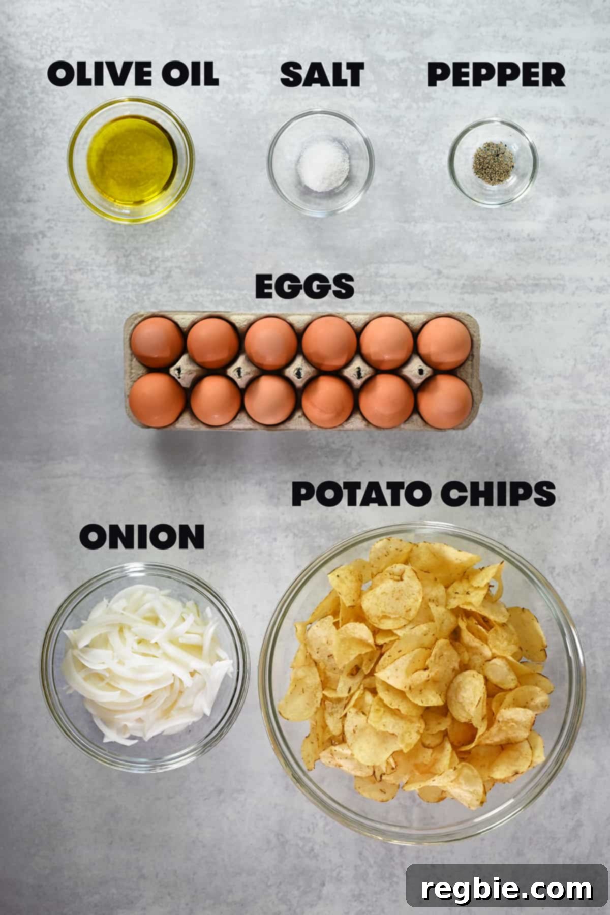 Crispy Potato Chip Tortilla 5 An overhead shot of the ingredients to make a Spanish tortilla, tortilla espanola, with potato chips.