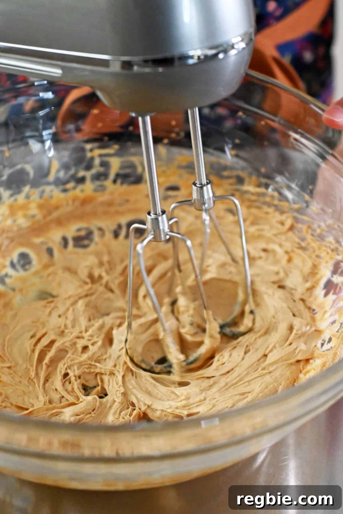 The paleo and gluten-free snickerdoodle batter, now lighter in color and thick, after being mixed for 3 to 4 minutes with a hand mixer.