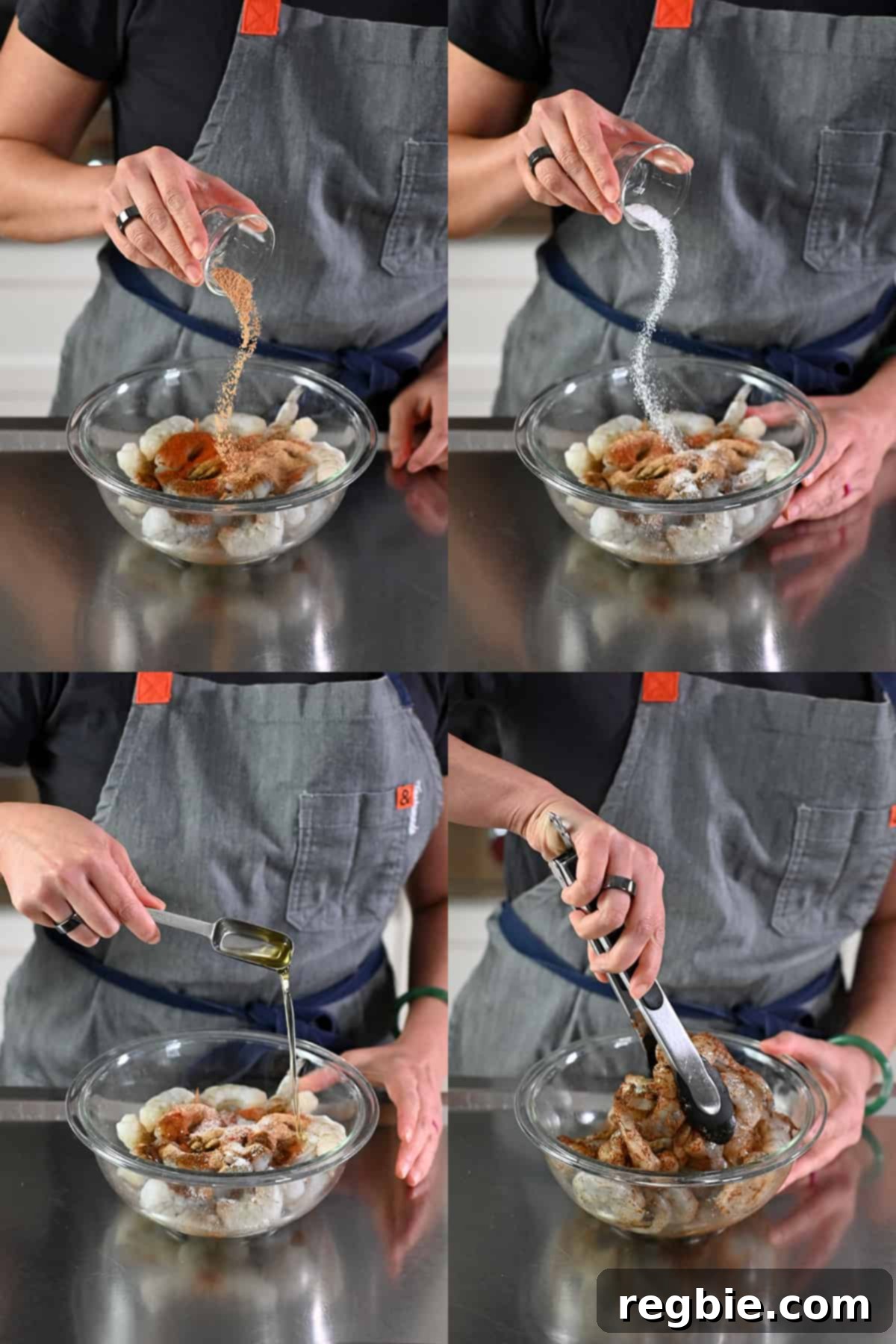 A close-up shot of a hand using tongs to toss raw shrimp with fajita seasoning and oil in a glass bowl, ensuring an even coating.