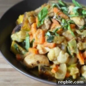 A beautifully presented bowl of homemade Thai Chicken Curry, ready to be enjoyed.