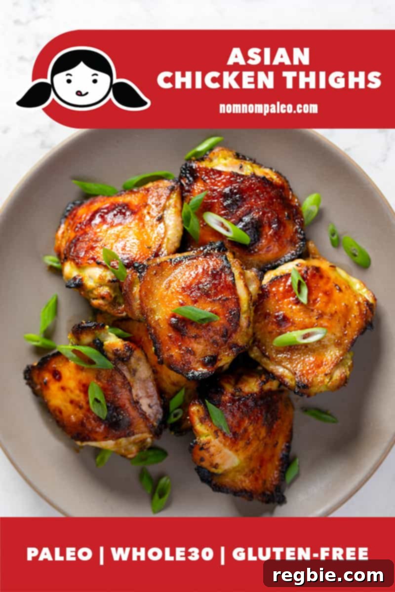 An overhead shot of Whole30 Asian Chicken Thighs on a beige platter. There is a red banner that reads Asian Chicken Thighs, Paleo, Whole30, and gluten-free.