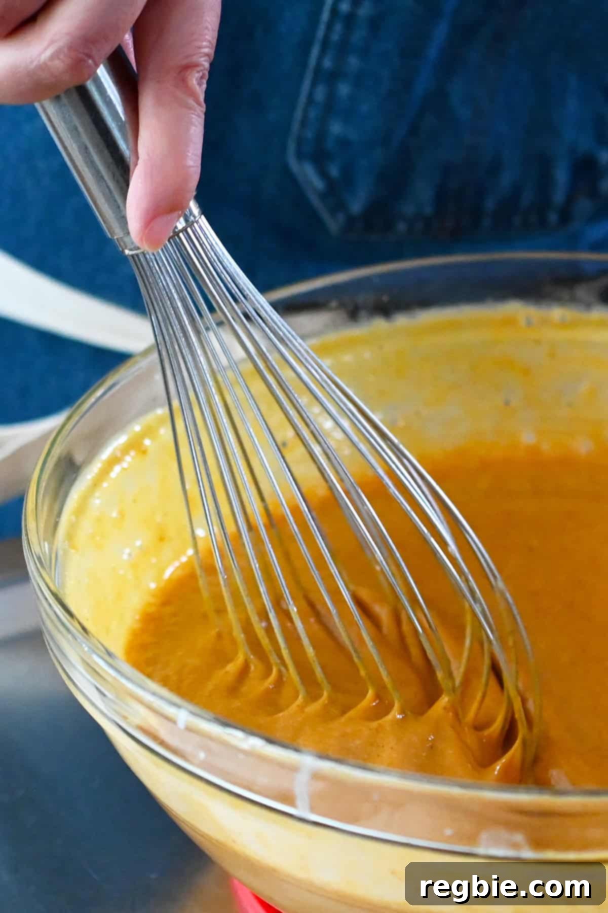 Golden Harvest Pumpkin Bars 19 A closeup of the mixed pumpkin pie bar filling ready to be poured into the cake pan and baked.