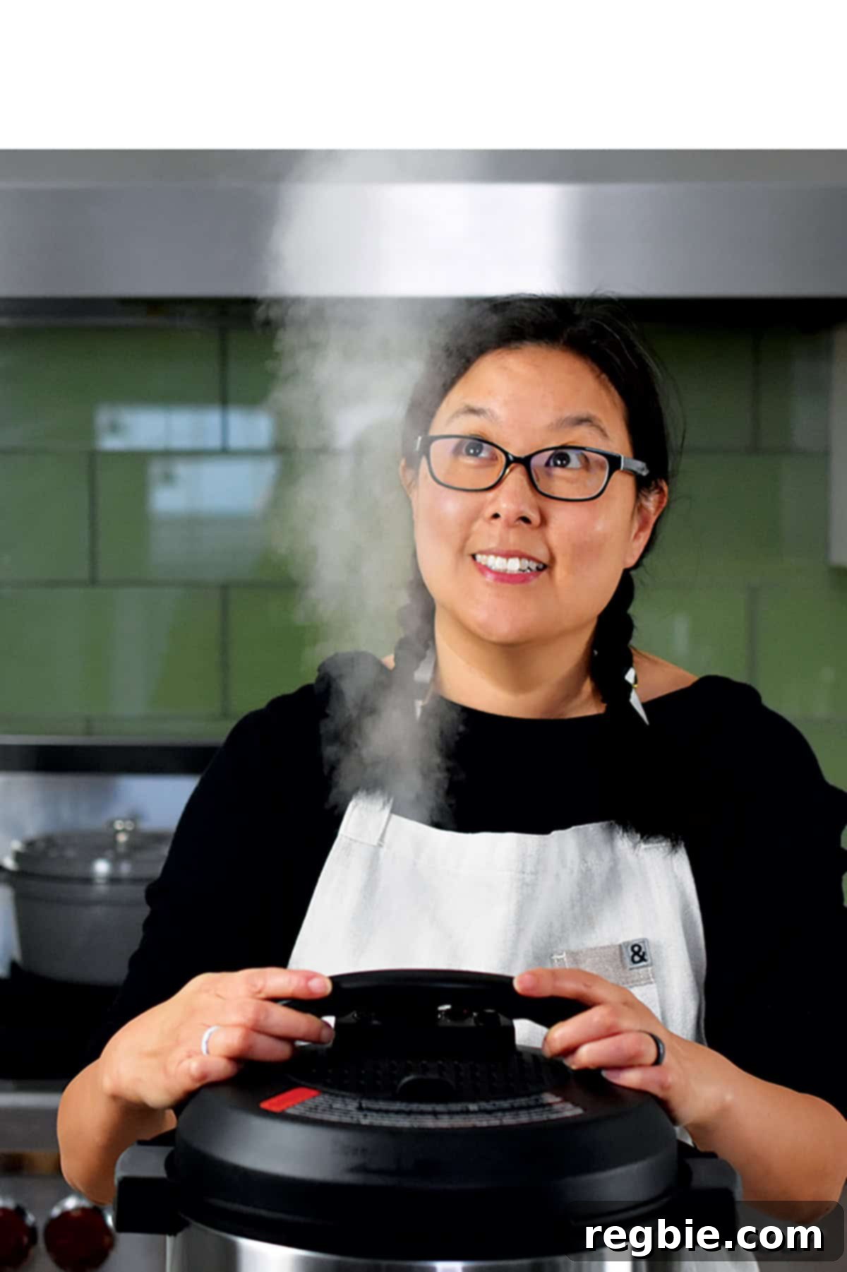 A woman carefully releasing the pressure manually from an Instant Pot, with steam visibly escaping, indicating the completion of the cooking cycle.