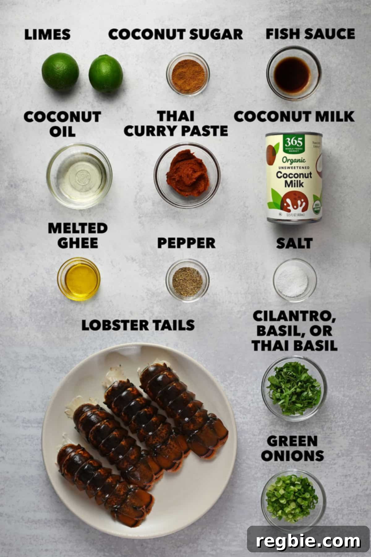 An overhead shot of the raw ingredients needed to make baked lobster tails or air fryer lobster tails with Thai red curry sauce.