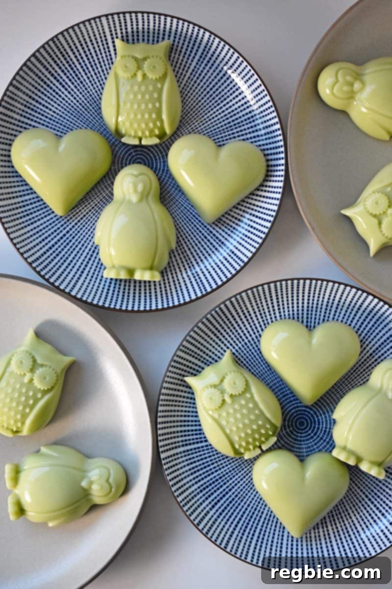 Plates filled with perfectly formed, creamy green matcha coconut gummies, highlighting their appealing texture.