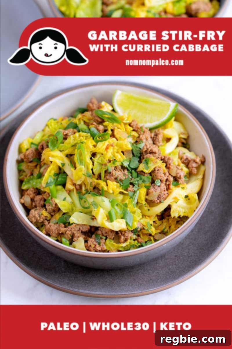 One Pan Beef Cabbage Wonder 2 An overhead shot of a steaming bowl filled with a hearty and aromatic ground beef and curried cabbage stir-fry, garnished with fresh cilantro, a perfect example of a Whole30, keto, and paleo-friendly one-pan meal.