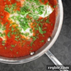 Quick Tomato Poached Cod One-Pan Meal 15 An overhead shot of Poached Cod in Tomato Sauce, a simple Whole30 and keto weeknight dinner solution.
