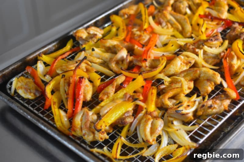 A side-by-side comparison showing Sheet Pan Chicken Fajitas baked on a wire rack versus without, clearly illustrating the non-soggy result.
