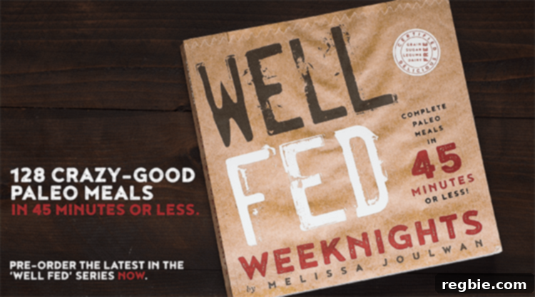 Keto Whole30 Spicy Dan Dan Noodles 7 Well fed weeknights cookbook by Melissa Joulwan on a wooden surface.
