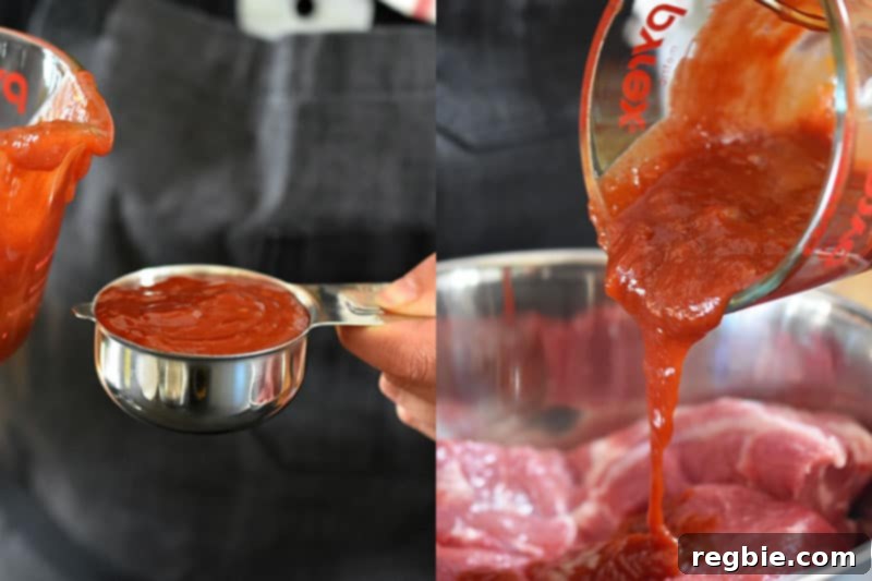 The cooled Paleo Char Siu marinade being poured over salted pork shoulder pieces in a large bowl.