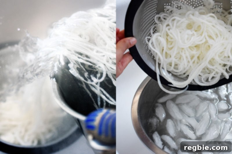 Someone quickly draining daikon noodles from the hot pot and transferring them to an ice water bath.