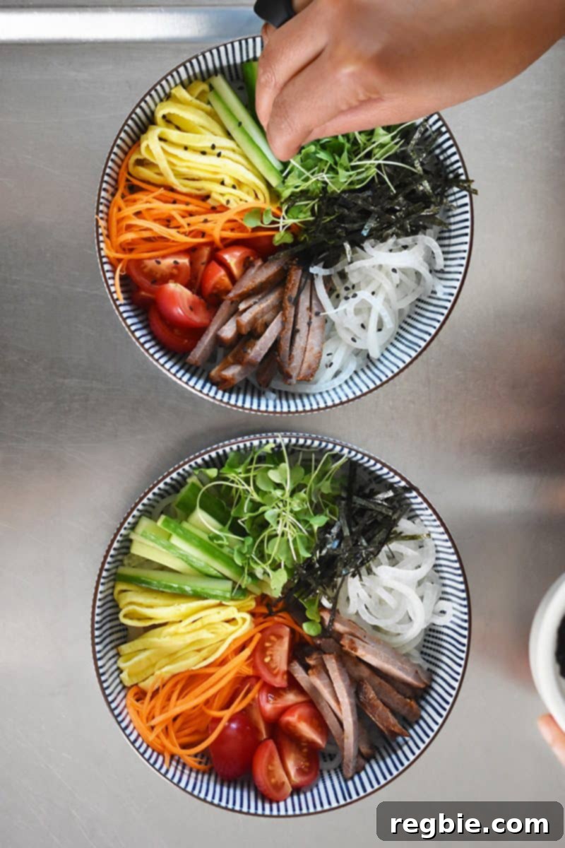 Two perfectly prepped bowls of Paleo Hiyashi Chūka, ready to be dressed and enjoyed.