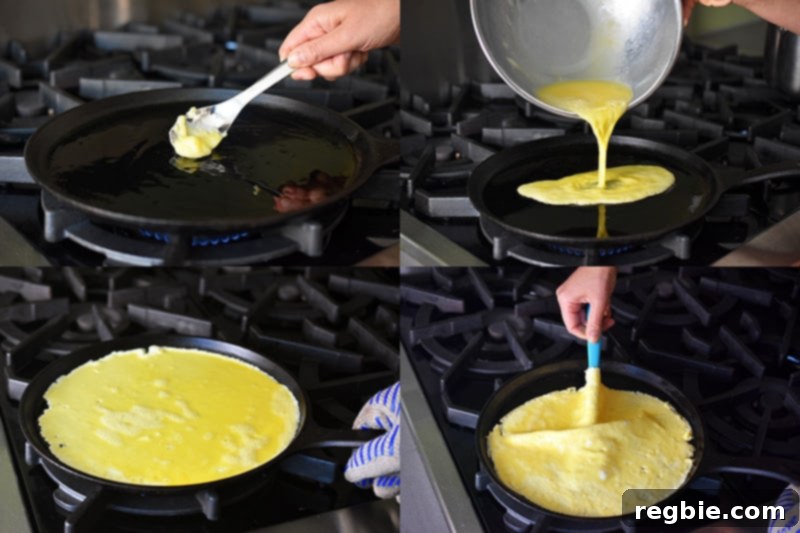 Buttering a flat skillet and carefully adding the beaten eggs to create a thin, even egg pancake.