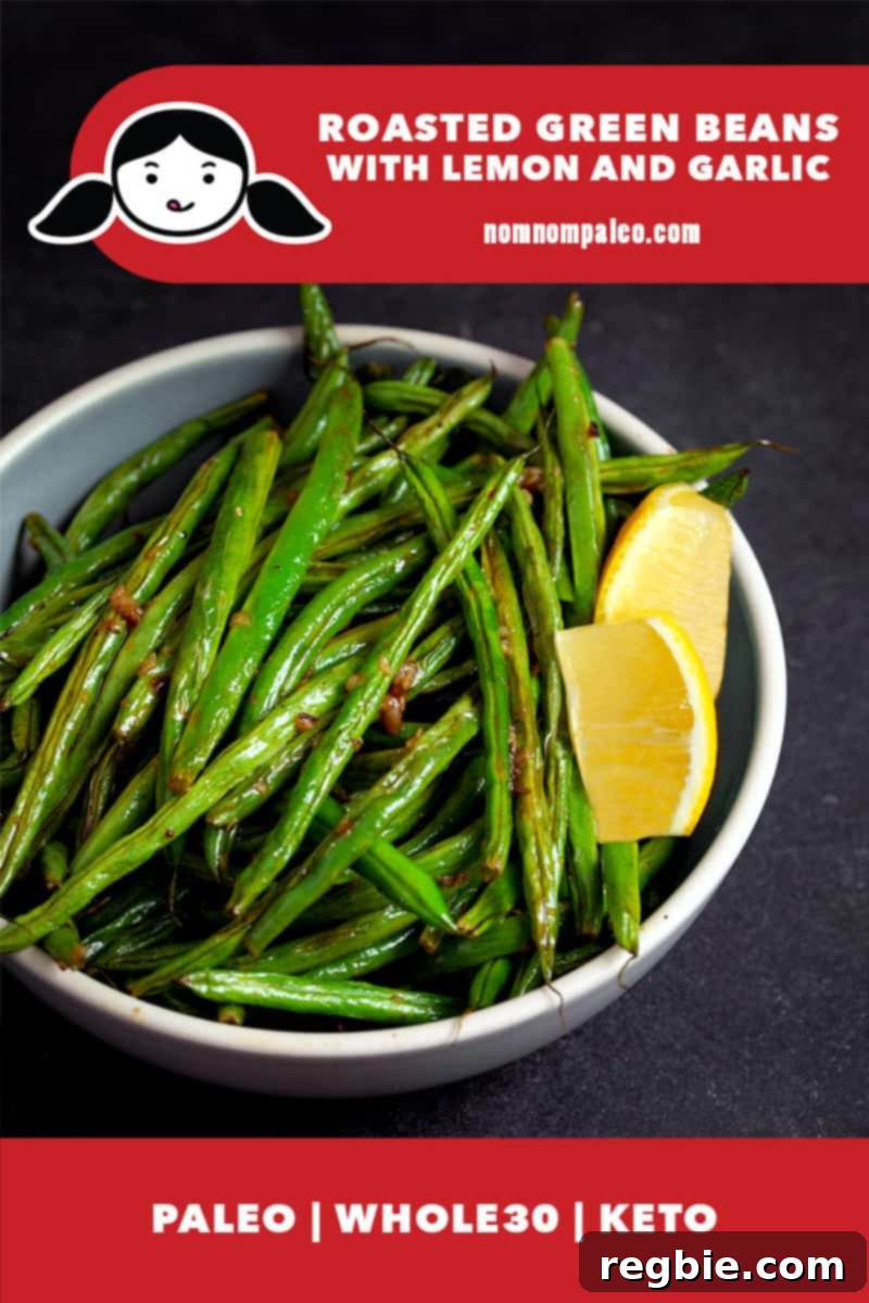 Crisp Lemon-Garlic Roasted Green Beans 2 A bowl of perfectly roasted green beans with lemon and garlic. The image highlights the beautiful char and fresh ingredients, with a banner stating, "Paleo, Whole30, Keto"