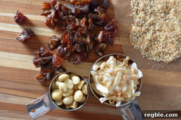 A visually appealing collection of all the essential ingredients for healthy, no-cook Liar Balls, including plump dates, crunchy macadamia nuts, and various coconut forms, artistically arranged on a cutting board, ready for the next step.