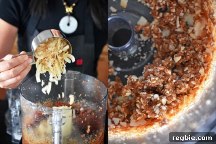 Toasted coconut flakes being carefully added to the date paste within a food processor, poised to be blended into a cohesive and flavorful base for these healthy energy balls.