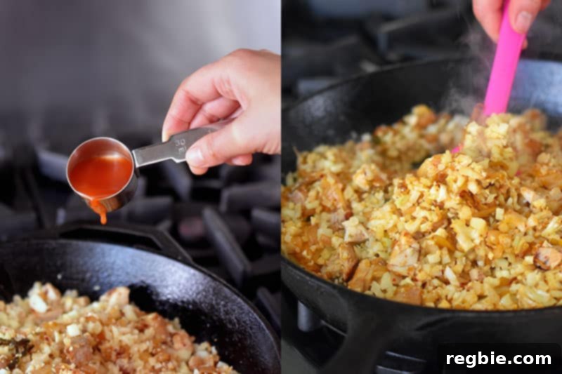 Kimchi juice being poured into the stir-frying mixture of cauliflower rice, kimchi, and chicken, adding a liquid boost of flavor.