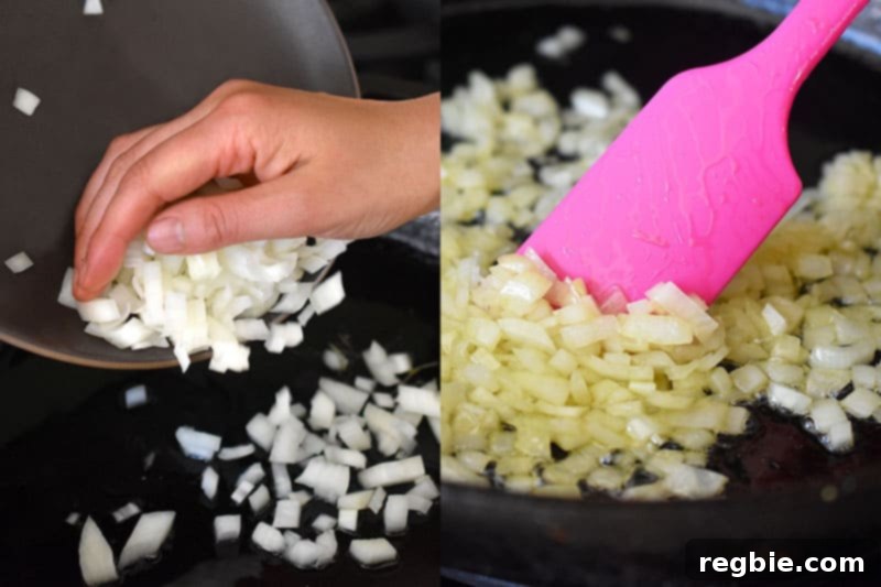 A close-up shot of chopped onions sizzling in a hot pan with avocado oil, being stirred for even cooking.
