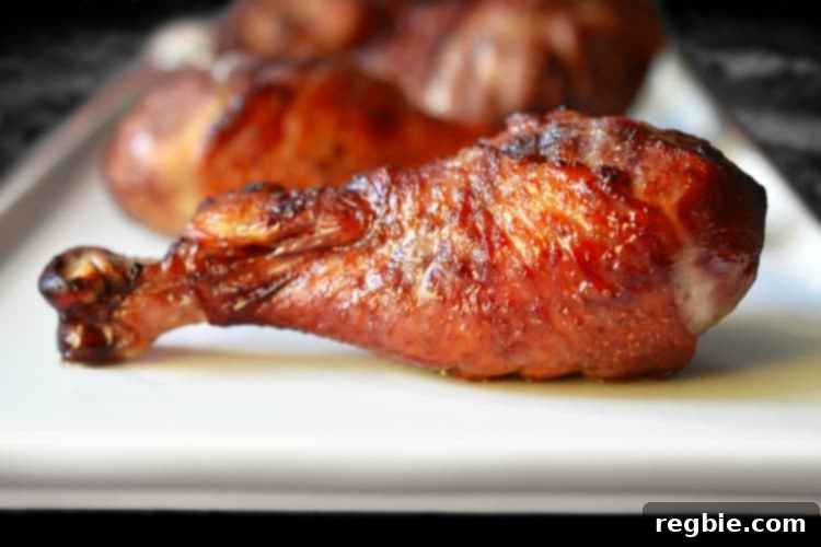 Wholesome Whole30 Cherry Chicken 12 A perfectly cooked plate of cherry chicken, ready to be served, with vibrant side dishes.