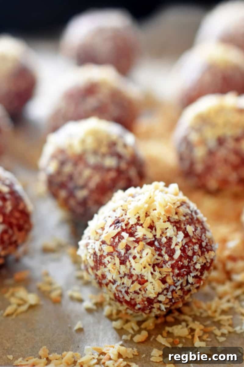 Peanut Butter Jelly Power Bites 11 A closeup of a tray of “PB&J” Energy Balls, healthy paleo and vegan snacks.