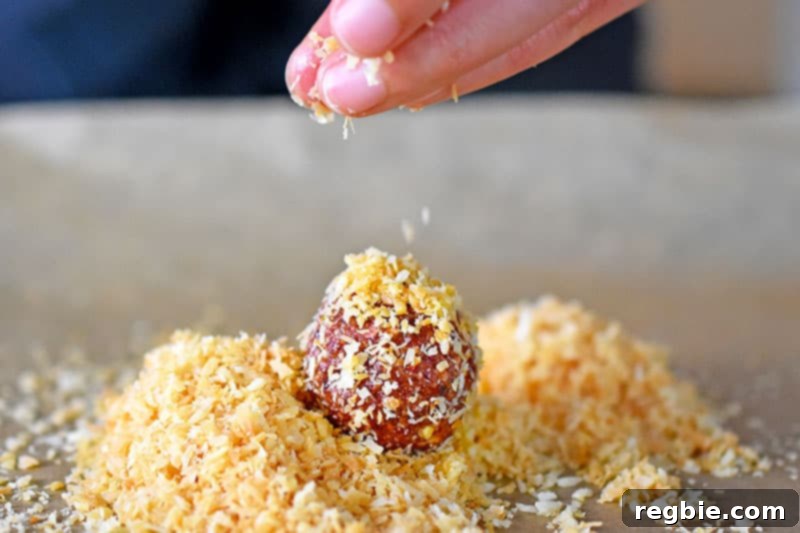 Peanut Butter Jelly Power Bites 10 Tossing “PB&J” Energy Balls into toasted shredded coconut.