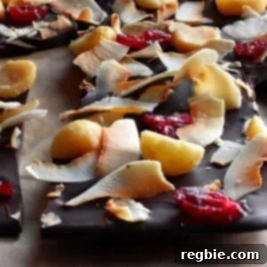 A generous portion of Coco-Nutty Dark Bark, topped with vibrant, delicious ingredients.