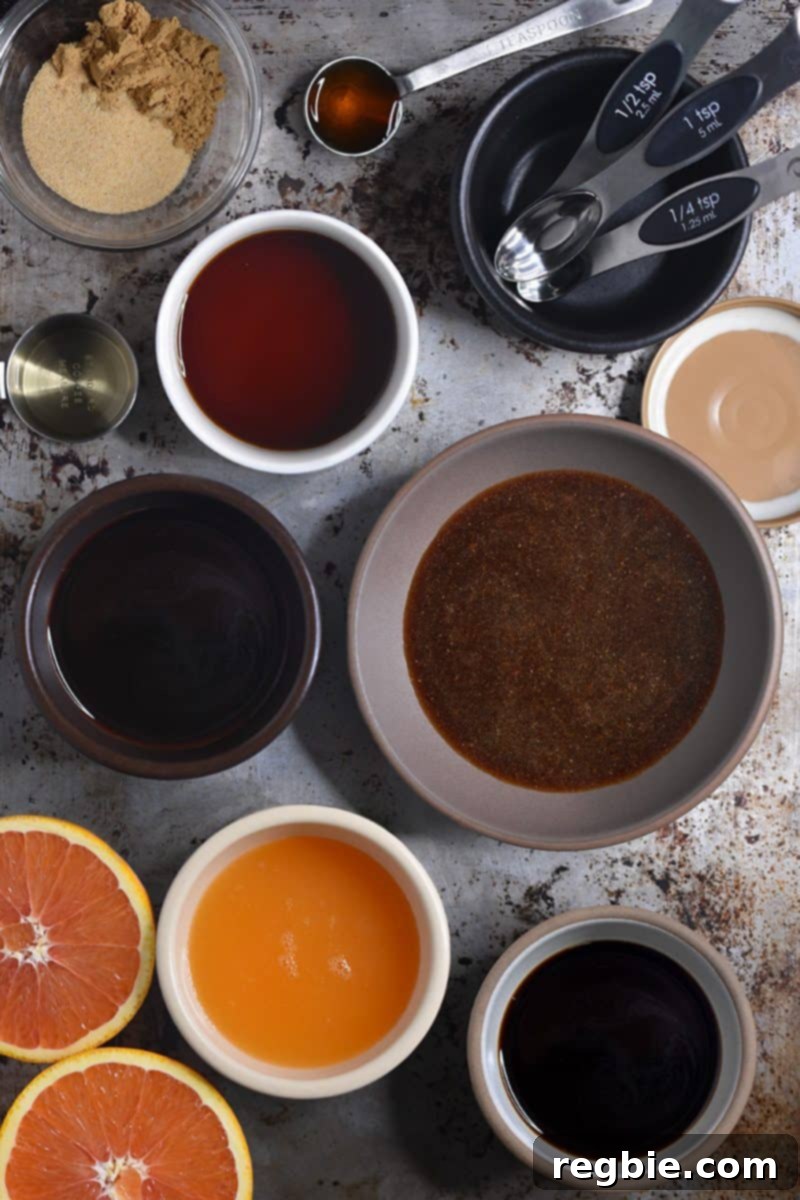 An overhead shot displaying all the individual ingredients required to make the All-Purpose Stir-Fry Sauce, emphasizing their freshness and quality.